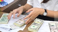 Dollar extends record run against dong