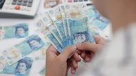 Sterling set for biggest four-week drop in a year before UK budget