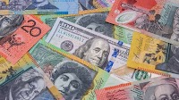 GBP/USD edges lower while AUD/USD slumps​
