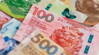 Hong Kong Resumes Currency Intervention Spree Amid Low Rates