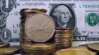 Will the Canadian dollar slip below 70 cents US?