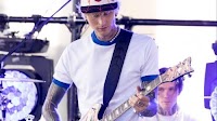 MGK reinvents himself on new album Lost Americana, featuring narration by Bob Dylan