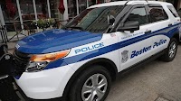 Boston police officer accidentally fires gun inside police station, department says
