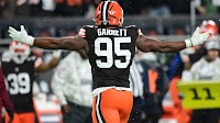 VIDEO: Myles Garrett taunts T.J. Watt with coronation celebration after third sack of Steelers' Russell Wilson