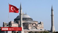Shan dhismo oo masaajid iyo kaniisado loo kala badalay