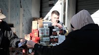 Falling food prices ease pressure as Syrian lira recovers on markets