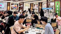 Malaysian coffee chain Oriental Kopi says sorry, drops CNY service charge hike