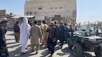 Suicide bombers kill nearly 50 at a Shiite mosque in Afghanistan