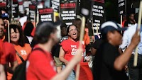 Greenwich Hyatt Regency workers join nationwide strike, citing 'painful work loads,' unfair wages