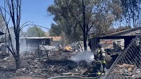 Crews mop up Magnolia Valley fire that damaged homes and cars, no injuries reported