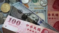 Taiwan dollar drops to 9-year low against US dollar