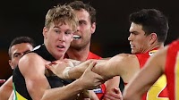 AFL world reacts as star doesn’t flinch