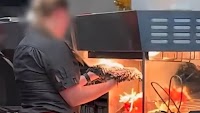 McDonald's employee caught drying mop under food heat lamp, sparking outrage