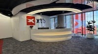 XTB revenues plunge 35% in Q3 2025 to $103 million on low volatility