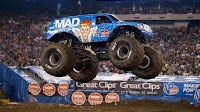 Monster truck Mad Scientist forward rolling into San Antonio