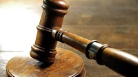 Janitor who urinated into women's water bottles pleads guilty to assault