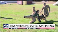 Emily Compagno visits military dogs at Joint Base MDL