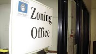 Residential association seeks reversal of zoning board’s approval of car dealership and repair shop