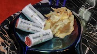 Houston's maddest dish is beef wrapped in an edible newspaper