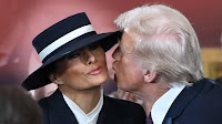 Melania Trump’s Absurd Inauguration Hat Had an Unmistakable Message for Us All