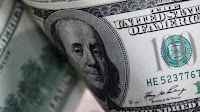 Dollar inches down on black market