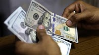 US dollar exchange rate up against UZS