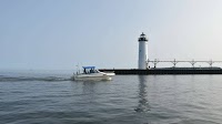 Manistee pier fishing brings bass, anglers catch Chinook and lakers trolling