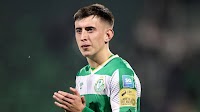Darragh Burns: MK Dons midfielder joins Grimsby in permanent deal