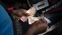 World’s Best Currency Subdues Ghana Inflation to Eight-Month Low