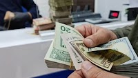 US dollar exchange rate slightly rises in Iraq