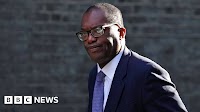 Pound hits record low after tax cut plans