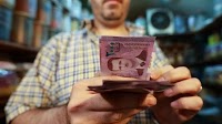 Plummeting Syrian pound hits new black market low