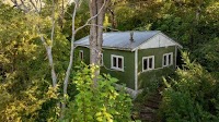 Shack owned by one of New Zealand’s ‘most influential artists’ is up for auction