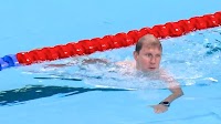 'Bob the Cap Catcher' saves the day at the Paris Olympics swimming heat
