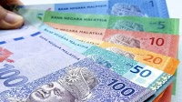 Ringgit rises against weaker US$