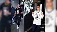 T.J. and Megan McConnell sport each other's jerseys before Game 1 of NBA Finals