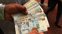 Peruvian Sol Defies Dollar Surge: Exporters and Banks Halt USD Rally