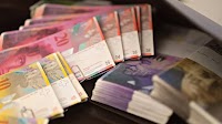 A Top Currency Forecaster Sees More Pain Ahead for Swiss Franc