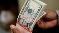 Dollar firms at 2-week peak against dong