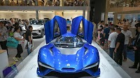 Chinese EV Maker Nio Sets Delivery Record, Cuts Losses
