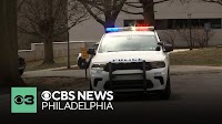 Man killed after Philadelphia officer shot, saved by bulletproof vest, police say