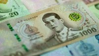 Asian currencies: Indonesian rupiah, Thai baht weaken