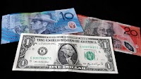 Aussie dollar slumps below 60 US cents for first time since COVID