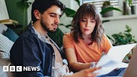 Interest rates cut but Bank of England halves growth forecast
