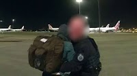 AFP officer allegedly stabbed in neck with pen after woman hauled off plane