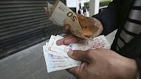 Algeria's black market for foreign currency underlines its economic woes