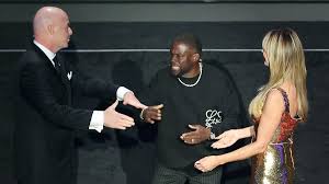 Awkward moment Gianni Infantino snubs Kevin Hart to embrace Heidi Klum on stage at FIFA's glitzy 2026 World Cup draw