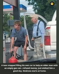 Teenager helps older man with gas for lawnmower