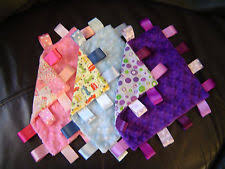 Résultat de recherche d'images pour "taggy blanket"