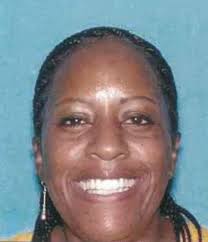 Yolanda Smith, 49, allegedly wore a white lab coat to trick her way into numerous Bay Area hospitals, where she stole employees&#39; credit cards. - YolandaSmith-515x600